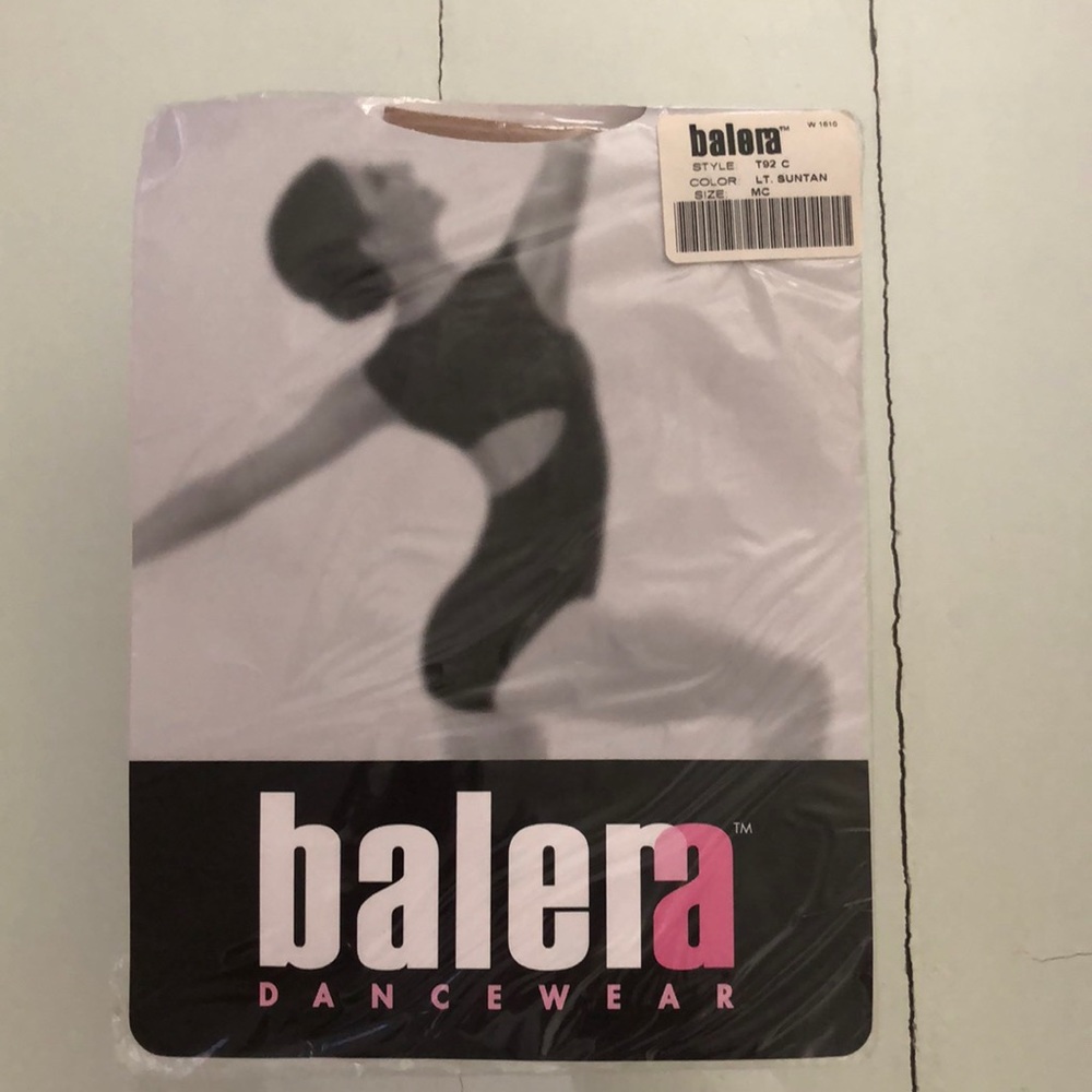 Balera light suntan medium child tights, new in unopened package.